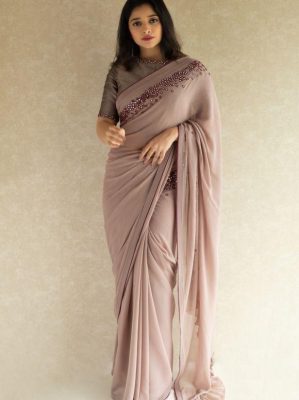 Radiant Light Peach Colour Georgette Saree